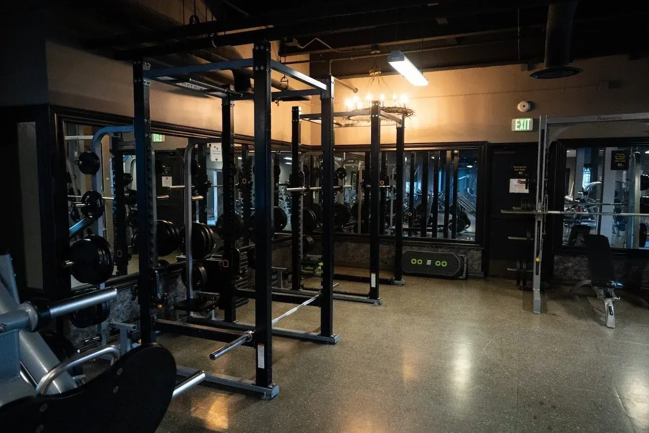Squat rack in the strength training area at Body Renew Alaska