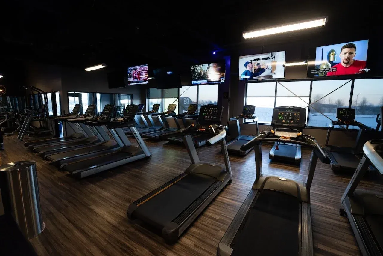 Row of treadmills in the cardio area at Body Renew Alaska