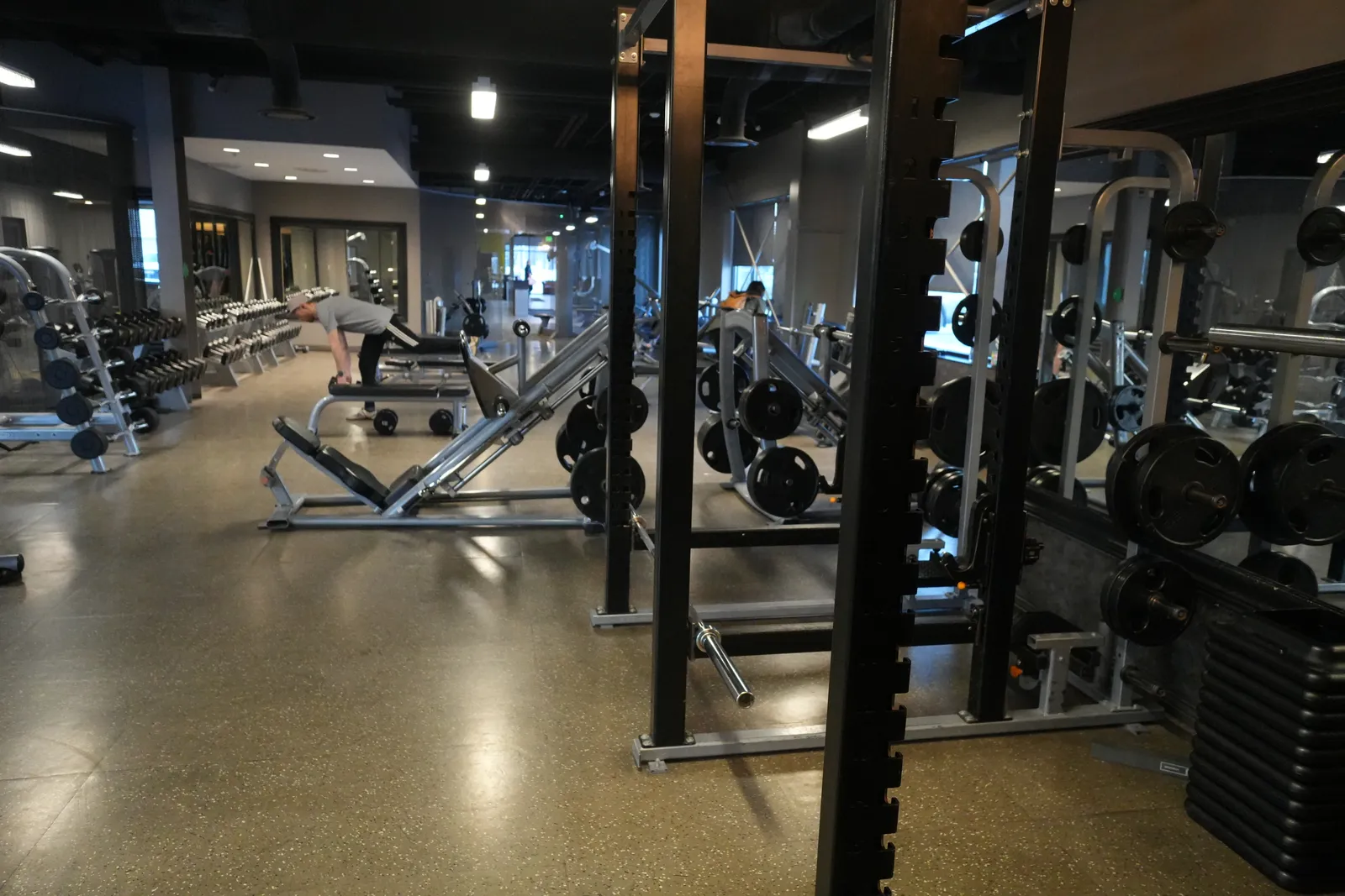 Free weight floor with squat racks and dumbbell racks at Body Renew Alaska in South Anchorage